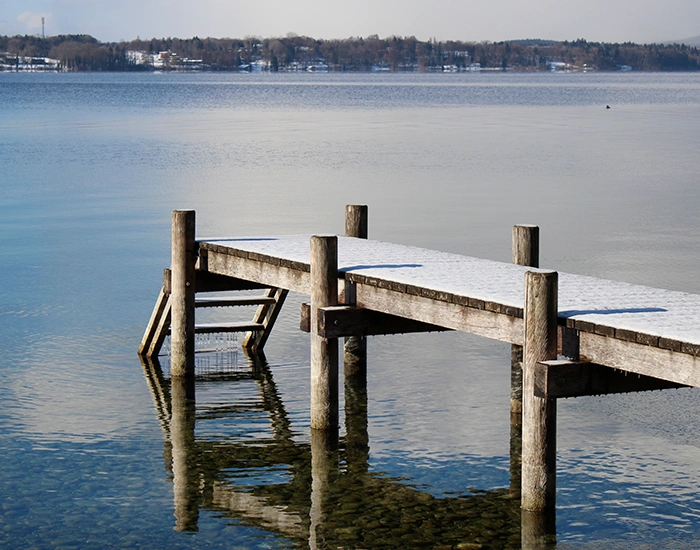 Different Types Of Lake Docks Displayed Beside Shoreline
